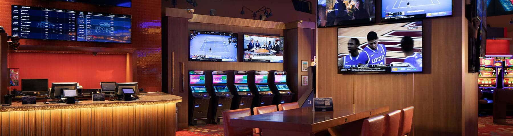 A picture of a sports betting lounge inside a casino. 